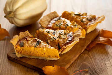 Pumpkin tart with feta cheese and herbs