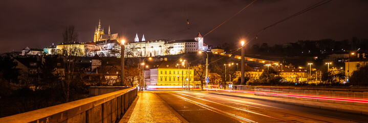 Fototapeta na wymiar Blurred night tram in Prague