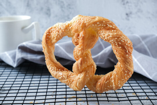Puff pastry twist with a cup of coffee
