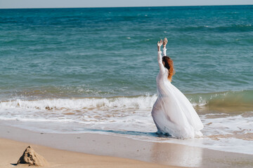 Fototapeta na wymiar pretty woman sandy beach waves ocean nature travel