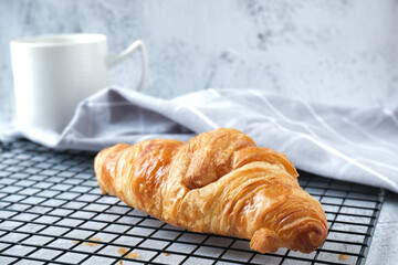 Croissant with a cup of coffee