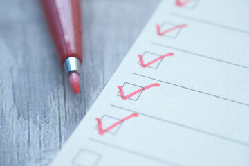 check mark on a check box on a paper 