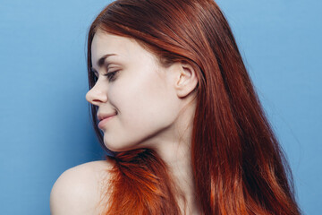 Fototapeta premium red-haired woman attractive look close-up bare shoulders