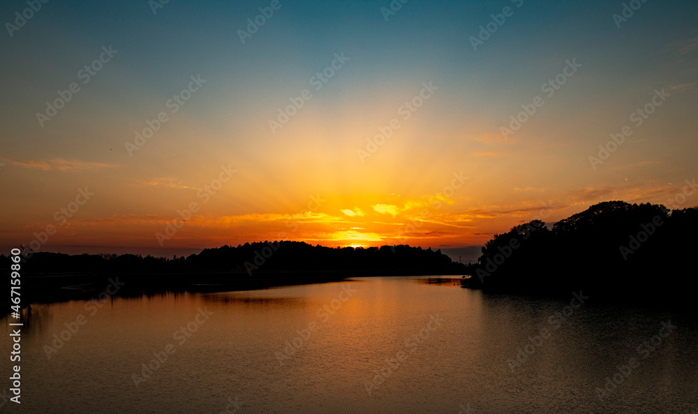 Sticker sunset over the river