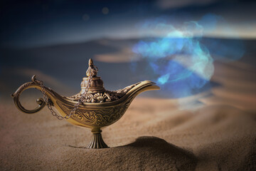 Magical Aladdin oil lamp with genie in desert at night. - obrazy, fototapety, plakaty