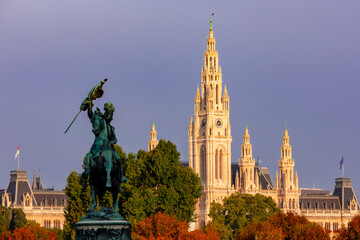 Fototapeta na wymiar Statue of archduke Charles and Vienna City hall at background, Austria