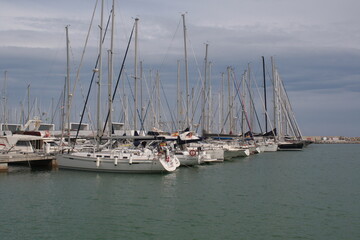pier with yachts in barcelona on a sunny day