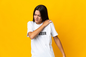 Teenager volunteer girl suffering from pain in shoulder for having made an effort