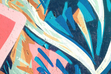 Closeup of colorful teal, pink and beige urban wall texture. Modern pattern for wallpaper design....