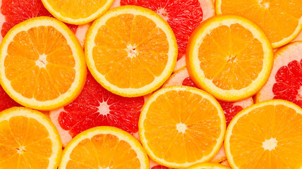 Mockup background with sliced grapefruits and oranges. Fruit background banner