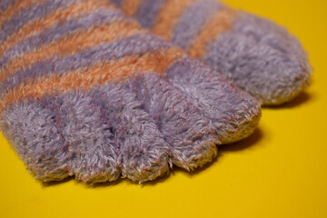 women's warm socks on a yellow background
