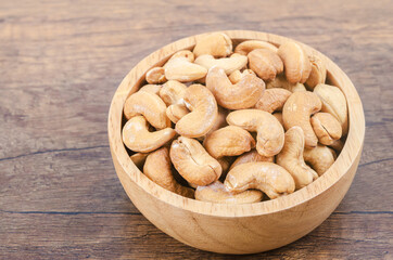 Tasty cashew nuts in bowl.