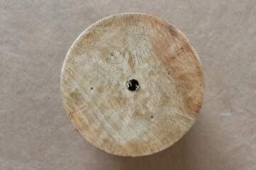 large wood spool viewed from above