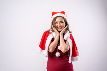 Beautiful Asian woman wearing santa costume and Santa hat,Happy New Year,Christmas,Celebration concept.