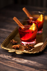 Hot wine in glass glasses. Festive mulled wine with spices
