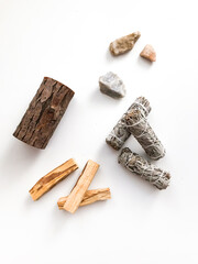 bunches of white California sage on a white background, minimalism and a place for text. sacred incense, aromatherapy and meditation