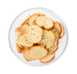 Crispy rusks with seasoning in bowl isolated on white, top view