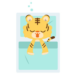 布団で眠っているトラ