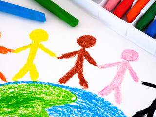 Different people on the Earth. Hand drawing oil pastel painting with some oil pastels near it.