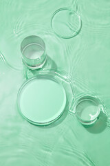 Transparent blue colored clear water surface texture with ripples, splashes and bubbles , white...