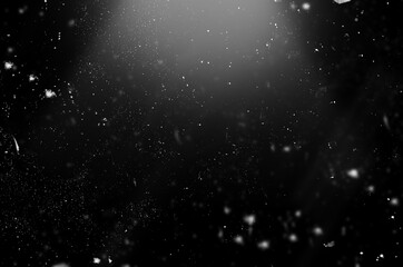 falling particles on a black background. can be used with screen overlay mode