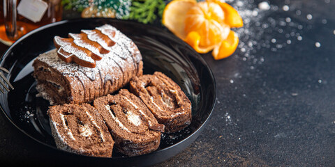 christmas cake roll chocolate white cream new year meal snack on the table copy space food background rustic 