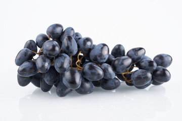 Bunch of black grapes isolated on white background with copy space, clipping path