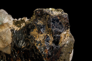 Macro of a mineral stone Sphalerite with fluorite and pyrite on a black background close up