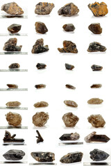 Macro mineral stone smoky quartz, rauchtopaz on a white background