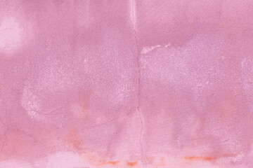cracked pink wall. Purple concrete wall texture for background. High resolution through retouching process Paint the concrete walls in pastel colors. Purple wall background and texture.