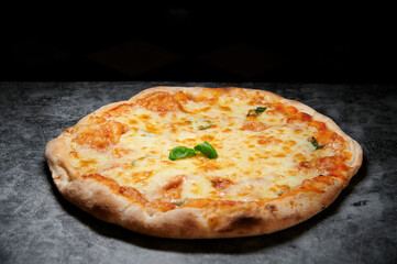 pizza with cheese and various ingredients