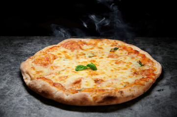 pizza with cheese and various ingredients