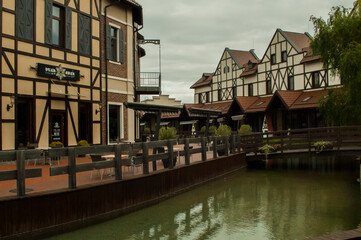 Fototapeta premium Old canal houses, coffee shop
