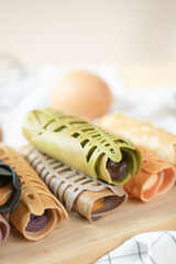 Crispy crepe roll with fresh sweet cream. Thai dessert call ‘kanhom tokyo’.