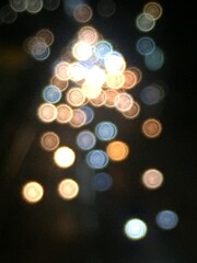 Blurry light of building on river background and texture in the night.
