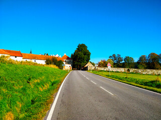 Road to village in South Bohemia during beautiful summer day.