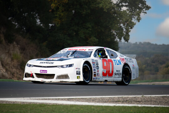 Chevrolet Camaro Race Nascar On Straight Racetrack Side View