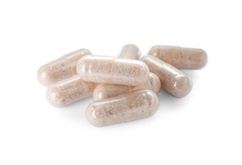 Many transparent gelatin capsules on white background