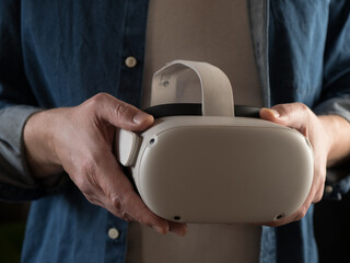 Man holding a virtual reality headset