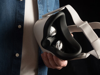 Man holding a virtual reality headset