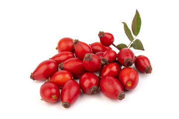 The rosehip isolated on white background. Fresh raw berries with leaves.