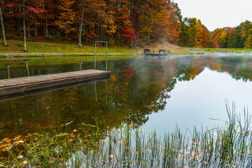 Fall Color and Fishing Pier Reflection on Boley Lake, Babcock State Park, West Virginia, USA