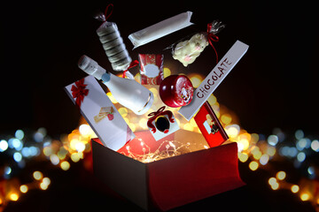 
box with gifts sweets on bokeh background