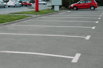 Car parking lots with white marking lines outdoors