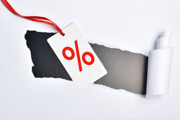 The percentage sign on the label on a black and white background