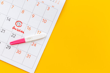 Ovulation day mark in calendar with ovulation home test