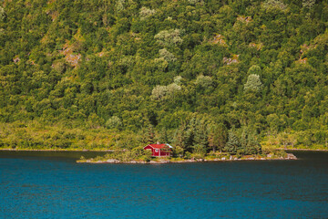 Landscape in Norway red house on island introvert style traditional scandinavian architecture...