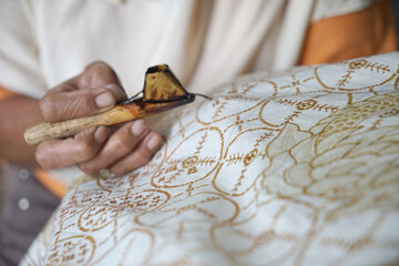 The process of making batik. Batik is a handmade traditional art from Indonesia. Produced by...