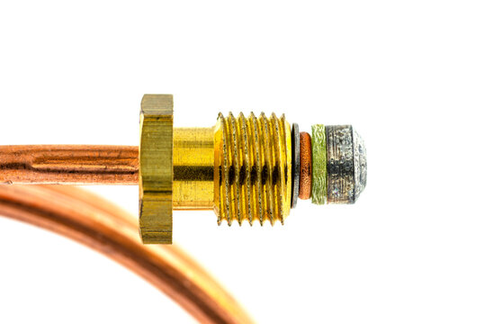 Macro photo of a spiral shaped temperature probe thread, isolated on a white background.