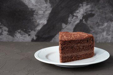 Brown cake isolated on the black background